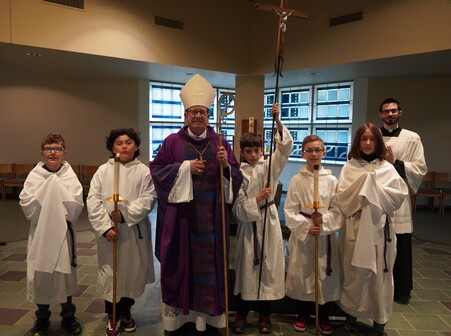Bishop Walkowiak and Student Servers